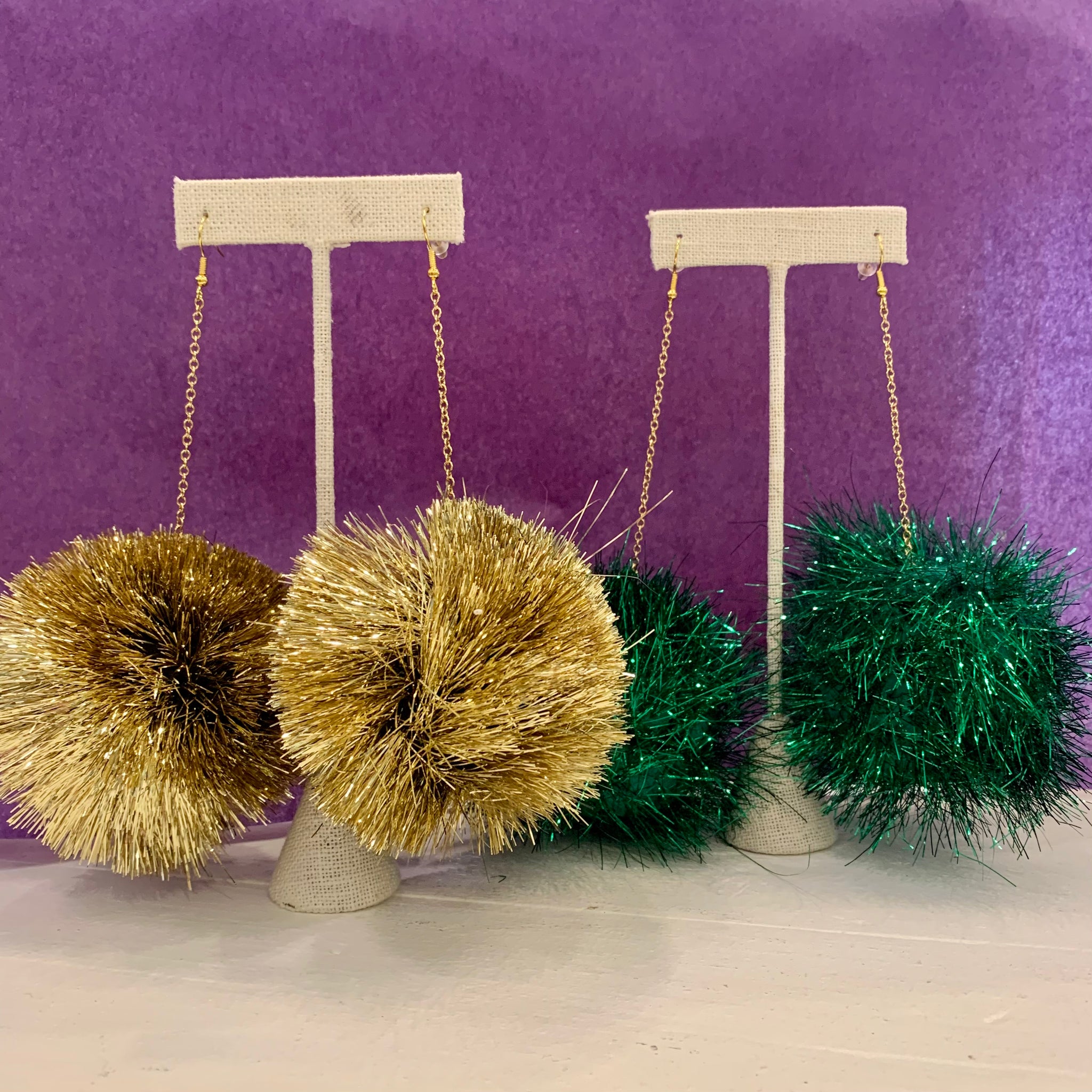 Purple pom 2025 pom earrings